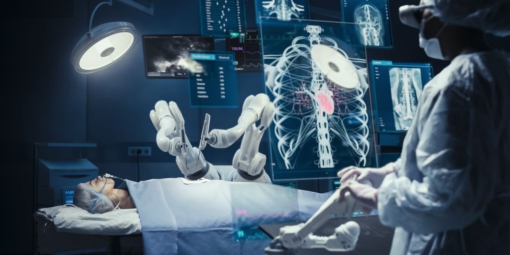 médicos usando um dos tipos de robótica para realizar cirurgia