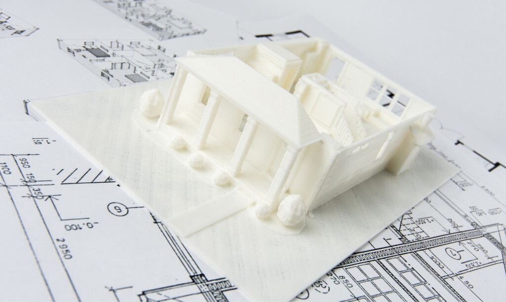 modelo de casa impresso representando como ganhar dinheiro com impressora 3d