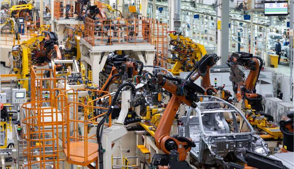 máquinas industriais representando a inteligência artificial na automação